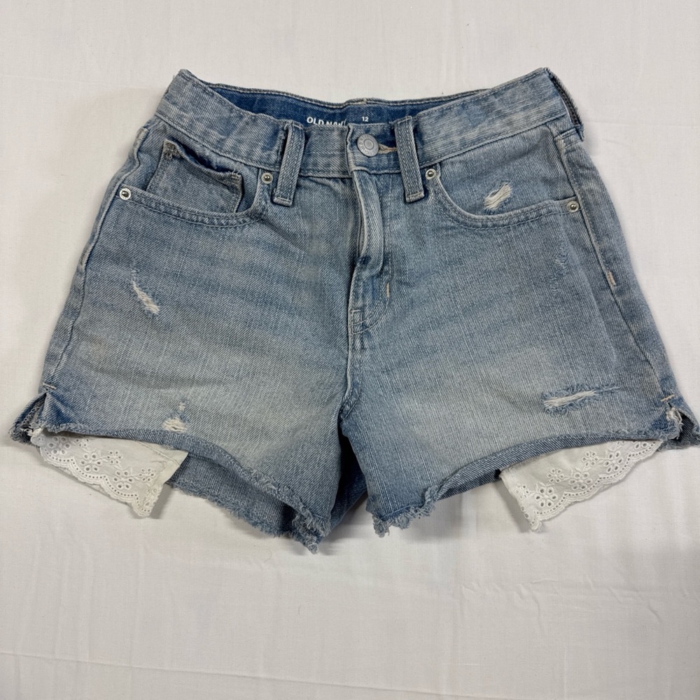 Old Navy blue denim shorts with lace trim on pockets Girls size 12